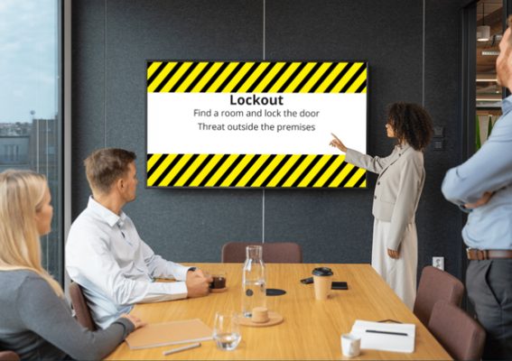 Visual Event showing a lockdown alert on a conference room display