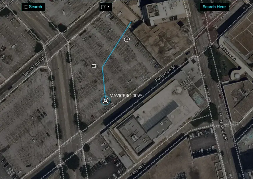 Live airspace map tracking a detected drone's flight path and pilot location in real time